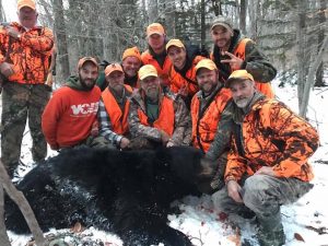 group of hunters with a 572 black bear harvested in Pennsylvania
