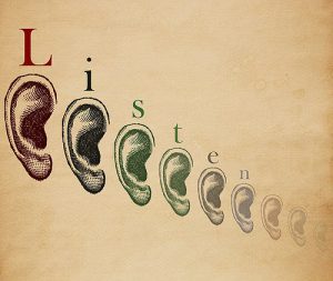 "Listen" written out with an ear under each letter