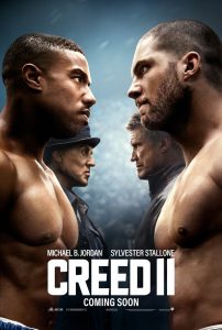 Creed II movie poster consisting of two sets of men staring at each other
