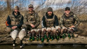 Members of Heartland Waterfowl posing with the days hunting catch