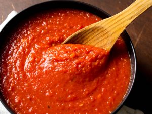 Marinara sauce being made for cooking
